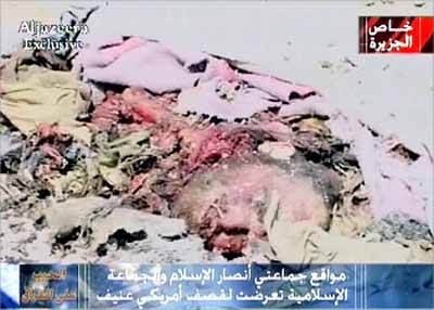 Remains of an Iraqi civilian killed by American and British missiles - Al Jazeera TV